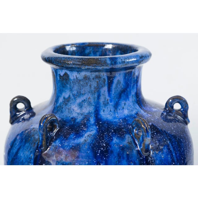Vintage blue glazed garden urn. Spectacular cobalt blue glaze with varying dark to light shades. Glazed on the interior....