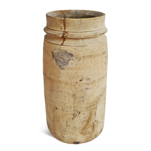 Hand-carved from solid wood in rural India, these antique lassi pots were originally used for storing and churning...