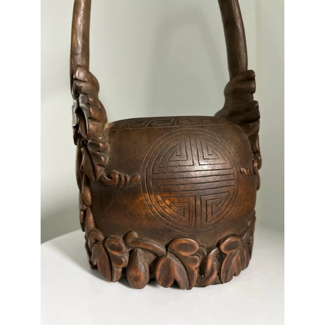 An absolutely stunning hand/carved bamboo piece of Asian folk art. Detailed leaves of ivy crawl up handle and frame the...