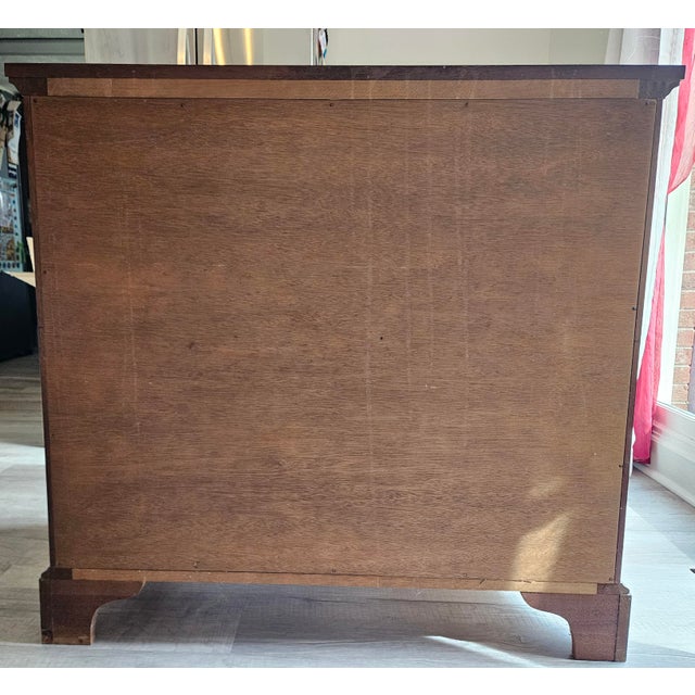 This is a beautiful, solid mahogany chest with four graduated drawers. This chest was made by the famous Mebane, NC...