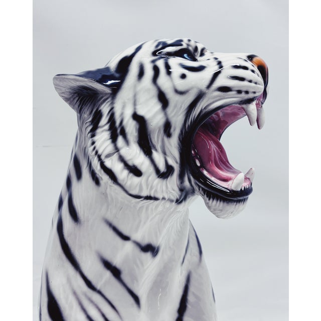 Unique handmade statue of a white tiger. This Hollywood Regency statue, made of hand-painted ceramic and made in Italy,...