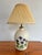 Hand-painted studio pottery lamp featuring happy purple violets. No maker's mark. Most items found at Pub & Oasis are...