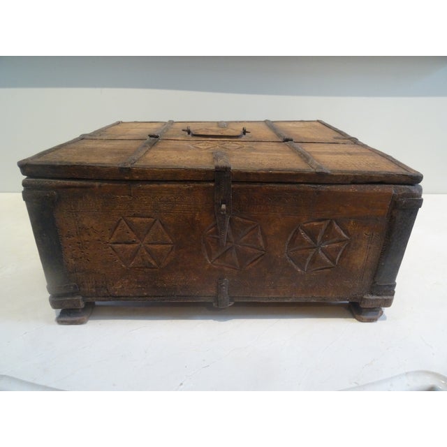 A Vintage Hand made Storage Box with metal trim and a rich patina. The door opens from the top and reveals the interior....