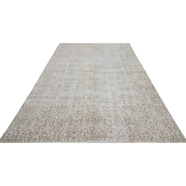 Handknotted vintage rug from Oushak region of Turkey. Approximately 50-60 years old. In very good condition