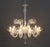 Murano Clear Glass Ten Branch Chandelier, with scroll form accents and drop crystals. 38" H x 35" Diameter. Provenance:...
