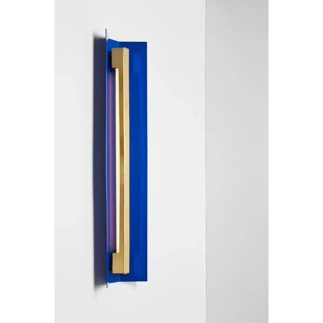 Medium misalliance ex ultramarine wall light by lexavala dimensions: d 16 x w 100 x h 8 cm materials: powder coated shade...