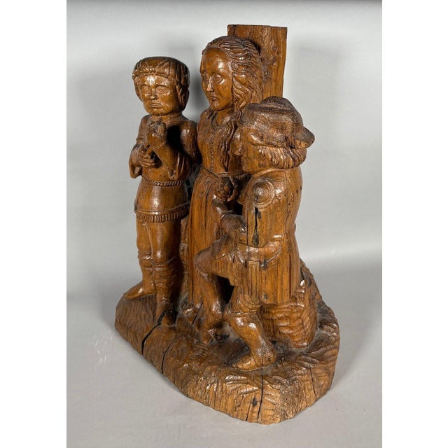The Martyrdom of Saint Apollonia, 15th Century Carved Wood. Saint Apollonia, carved in the round. She is depicted standing...