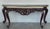 20th French Regency carved walnut console table with gilted edges 20th century French Regence style beautifully carved...