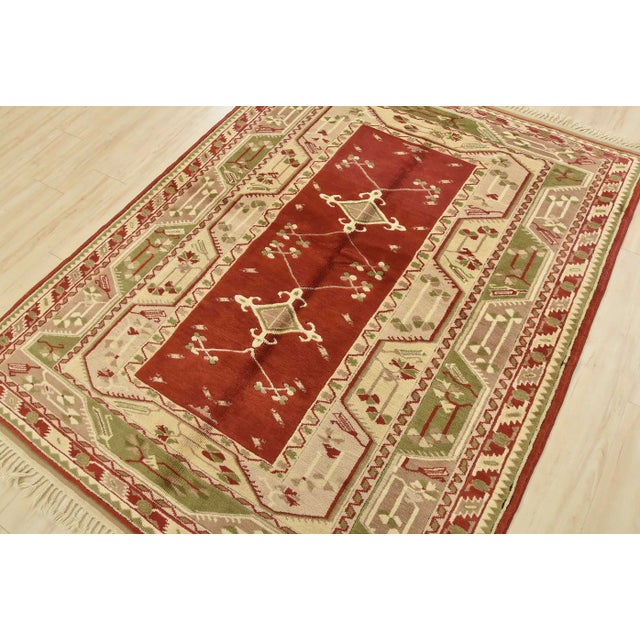 This authentic vintage traditional tribal Milas rug is hand-knotted with fine wool and natural dyes. This oriental rug...