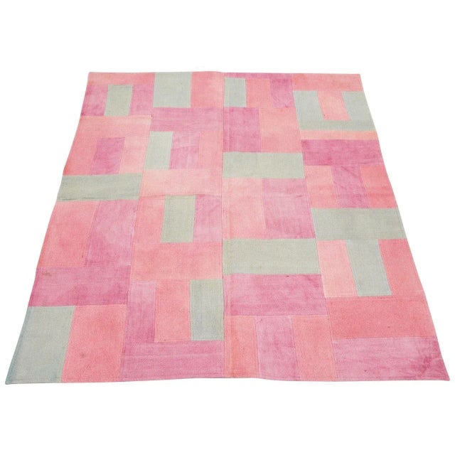 Vintage Turkish patchwork rug with natural colors, contemporary style and soft texture.