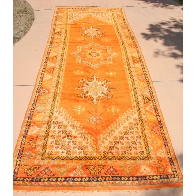 Vintage Moroccan Taznakht Berber Wool Rug in Burnt Orange, circa 1960s A striking vintage Moroccan Berber rug from the...