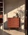 Danish chest of drawers produced by poul hundevad in denmark during the 1960s. executed in teak with oak legs and...