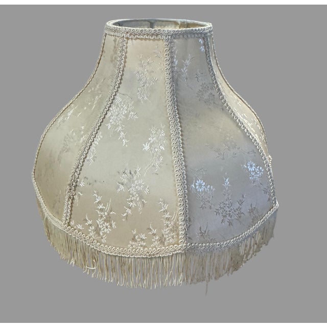 Beautiful vintage fabric lampshade featuring an elegant paneled, scalloped bell form with a soft ivory/cream silk or...