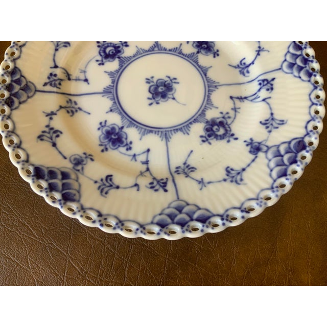 Distinct open work lace border and sculpted fish scale pattern around edges; traditional use as a bread, butter, side or...