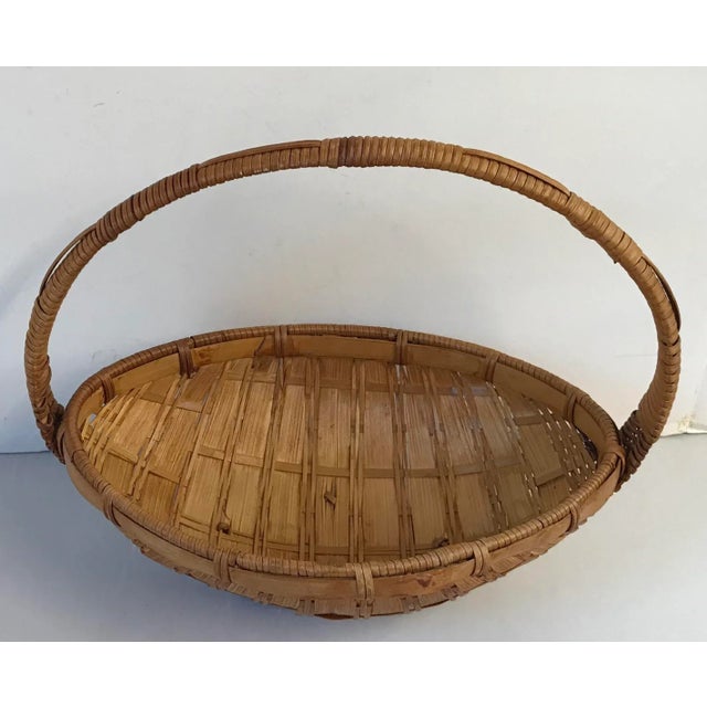 Nice oval shaped wicker handled basket!