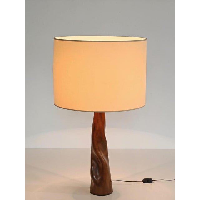 Magnificent sculptural table lamp in curved full grain italian brown leather. This incredibly stylish and unique piece was...