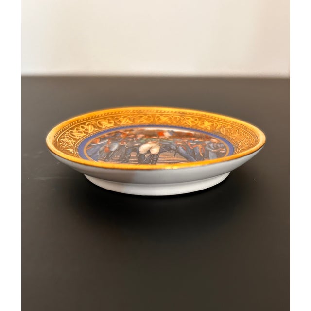 Antique porcelain miniature place with scene of Napoleon. By R. S. Prussia, it has richly detailed gold edging and an...