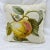 Vintage fruit design needlepoint pillow in lovely colors of yellow, pink and green. Measures 14 x 14 square. Polyfill insert