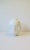 A relatively large white ceramic face or 'faces' vase, in the Surrealist/Surrealism style, circa early-21st century. This...