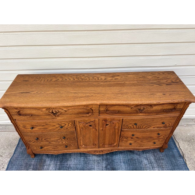 Rustic Late 20th Century Oakwood Interiors "Versailles" Carved Oak Chest of Drawers - Triple Dresser For Sale - Image 3 of 12