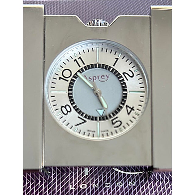 Asprey London Swiss Made Clic Clac Travel Clock, Original Box and Suede Pouch Offered for sale is an Asprey London Swiss...