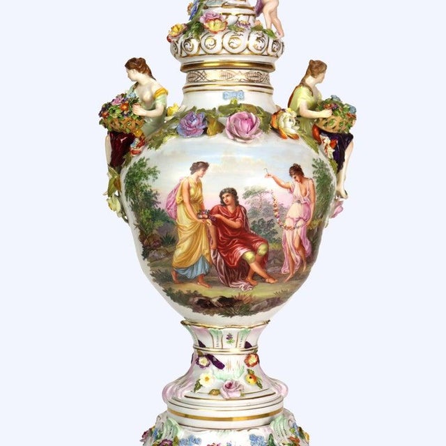 A striking Antique German Dresden porcelain palace urn with pedestal, dating to circa 1880, showcases the opulent Rococo...