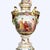 A striking Antique German Dresden porcelain palace urn with pedestal, dating to circa 1880, showcases the opulent Rococo...