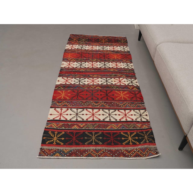 Vintage Hand-Knotted area rug is a semi-antique vintage area rug. The '70s Eastern region of Anatolia's unique rug is...