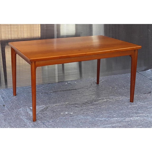 Extension boards 57.5 cm each. This piece is attributed to the mentioned designer/maker. It has no attribution mark and no...