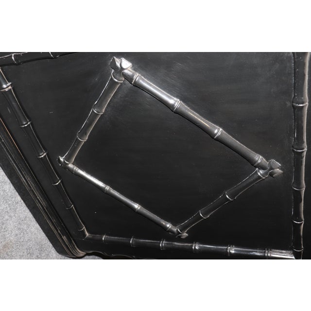 This is a beautiful cabinet-made faux bambook desk in the French or Campaign style. The desk features a fine off-white...