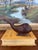 This sculptural whale figure is a finely hand-carved piece crafted from what is likely solid walnut, dating possibly to...