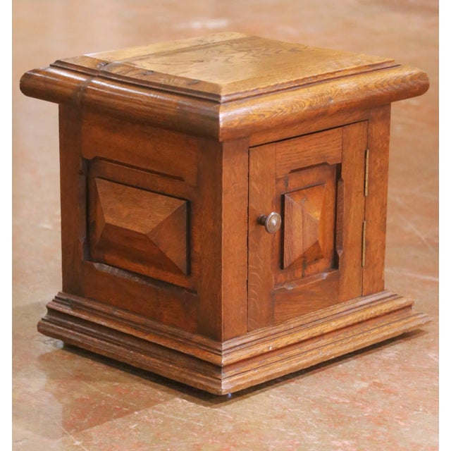Crafted in France circa 1880, this antique oak pedestal stand reflects the bold, architectural character of Louis XIII...
