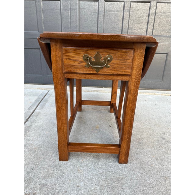 Beautiful vintage Pennsylvania House solid oak drop-leaf side table with classic American craftsmanship and timeless...