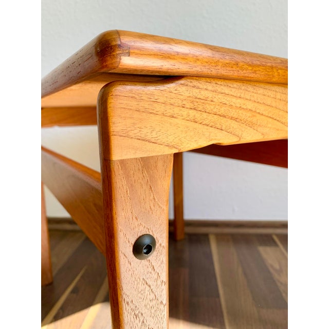 Beautiful set of three nesting tables made of solid teak wood, featuring hand-painted ceramic tile inlays. Crafted in...
