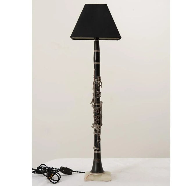 A vintage Corton clarinet made in Czechoslovakia (found in France) that has been upcycled into a fabulous table lamp...