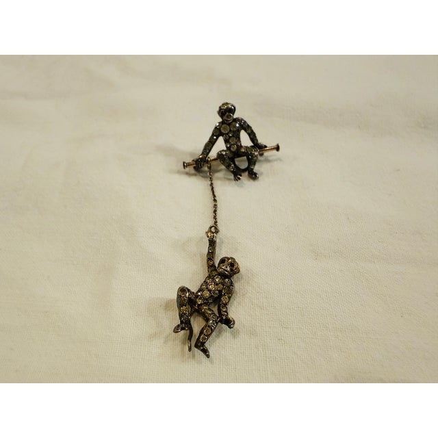 Antique Art Deco Sterling Silver Moving Monkey Brooch by Knoll & Pregizer, 1890s, in Good conditions. Designed 1890 to...