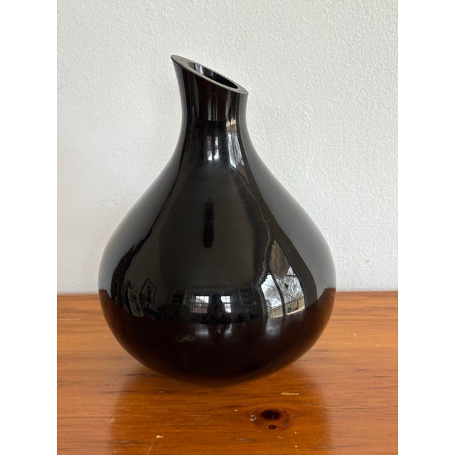 Simple yet stunning contemporary vase of shiny black glass. Please see condition details noted. Most items found at Pub &...