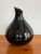Simple yet stunning contemporary vase of shiny black glass. Please see condition details noted. Most items found at Pub &...