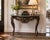An exceptionally decorative Italian-made console table for Sherrill featuring an elaborately carved wood base and richly...