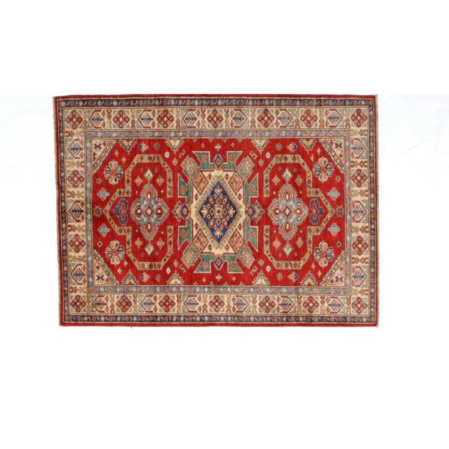 This master piece is a Ghazni wool pile very fine genuine hand woven Super Khotan quality in mint condition.