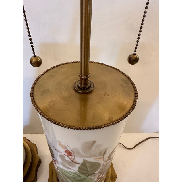 Pair of elegant Chinese hand painted porcelain table lamps having new leaf shaped finials and chocolate colored custom...