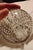 A clear glass crystal ball that displays graduated controlled bubbles inside commonly known as "bullicante" art glass....