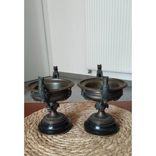 Rare pair of patinated bronze and black marble cassolettes – Winged griffins – Napoleon III period, 19th century An...