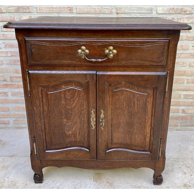 Walnut side table from the 50s, very useful for a living room with a drawer and a double door.