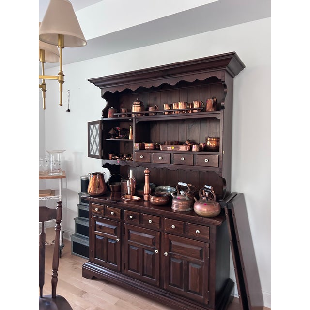 My mom uses it to display tons of beautiful copper but you can display whatever you collect! And you can use the bottom to...