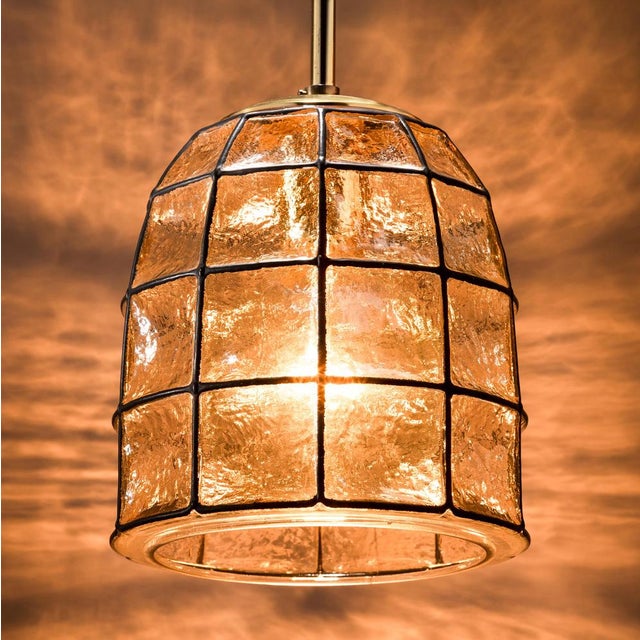 This exclusive pendant light was manufactured in the 1960s by the renowned glass manufacturer limburg in germany. The...