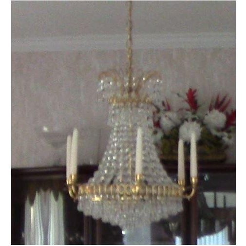Equisite chandelier for a small to medium-sized dining room or entrance foyer. Eye-catching, dramatic and beautiful. The...