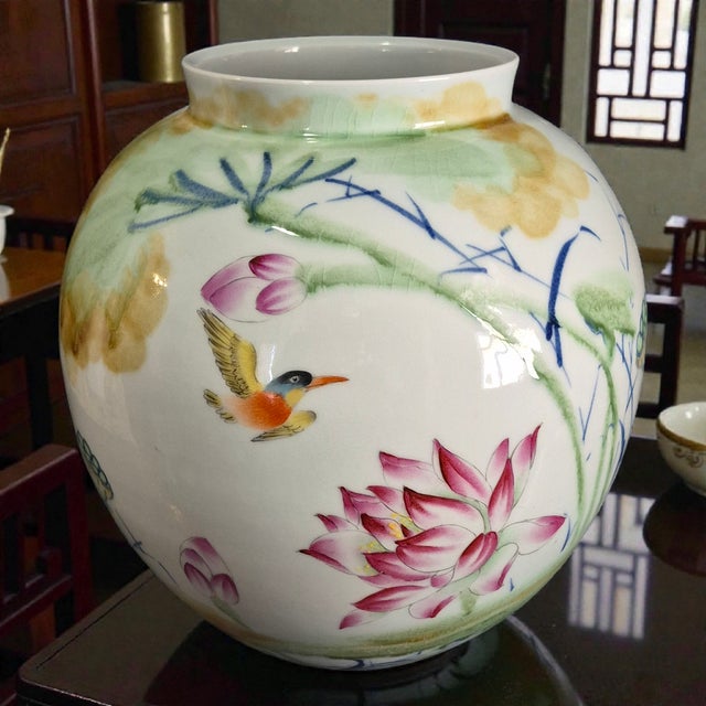 This large vase features intricate Asian Famille-Rose Lotus Floral, bird and calligraphy poem by "Du Fu", originating from...