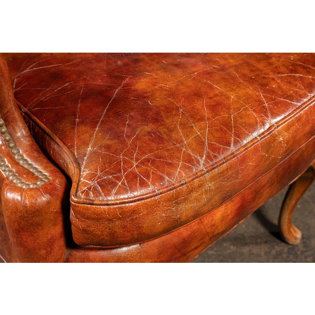 Mid 20th Century Tufted Leather Wingback Armchair in Burnt Amber For Sale - Image 13 of 17