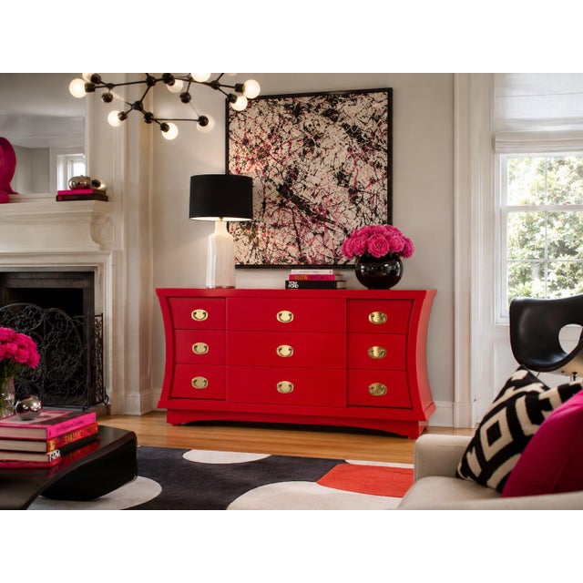 This piece is sure to be noticed with unexpected curves and a reimagining in glorious confident scarlet! We love the...